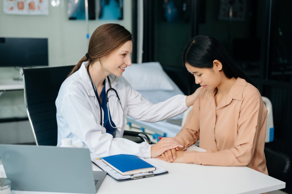 Psychology, depression. Suffering woman, consulting with psychologist, psychiatrist while patient
